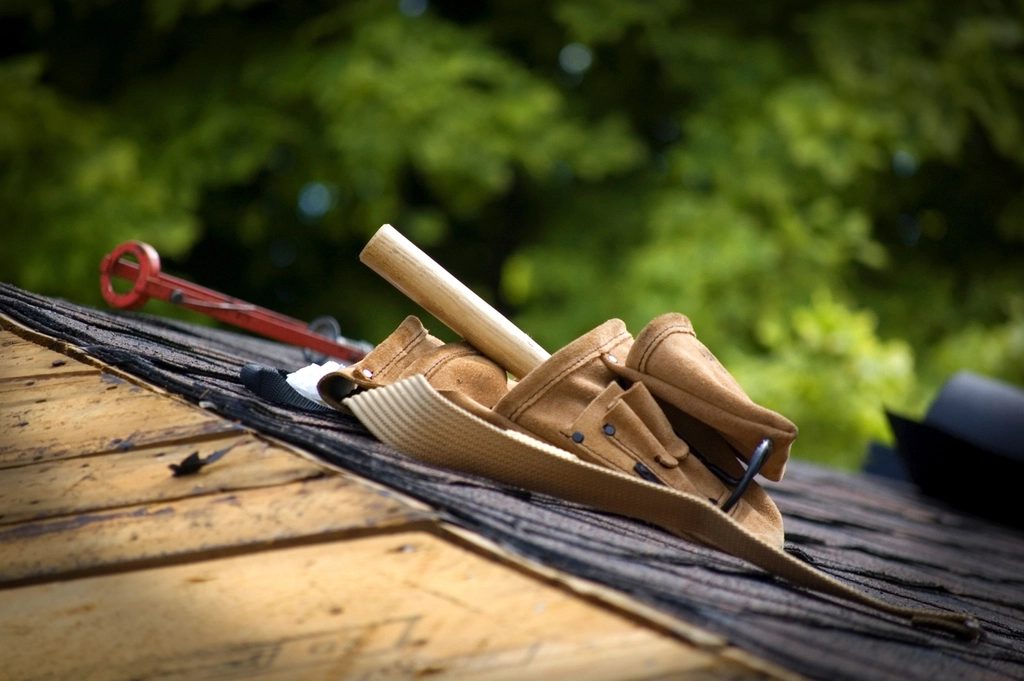 Roofing tools on fresh shingles